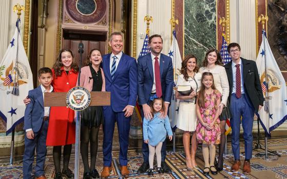 Newly sworn-in Transportation Secretary Sean Duffy, center left, and his wife, Rachel Campos-Duffy, center right, pose for a photo with their children and Vice President JD Vance, center, at the Eisenhower Executive Office Building in Washington, Jan. 28, 2025. (Wikimedia Commons/U.S. Department of Transportation)